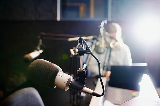 Blurry photo of someone working in a recording studio